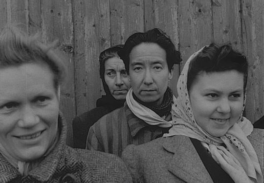 Filmstill from a black and white newsreel filmed in April 1945, showing Nadine Hwang as one of the survivors that arrived in Malmö